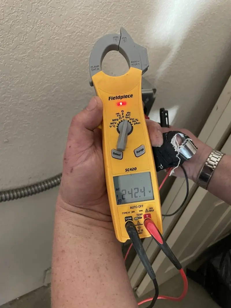Voltage testing with clamp meter during Ceiling Fan Installation in South El Monte